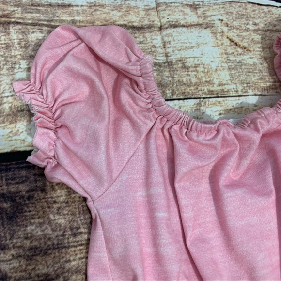 Girls pink romper by Young Hearts is in like new condition. Size 5 - Picture 4 of 8